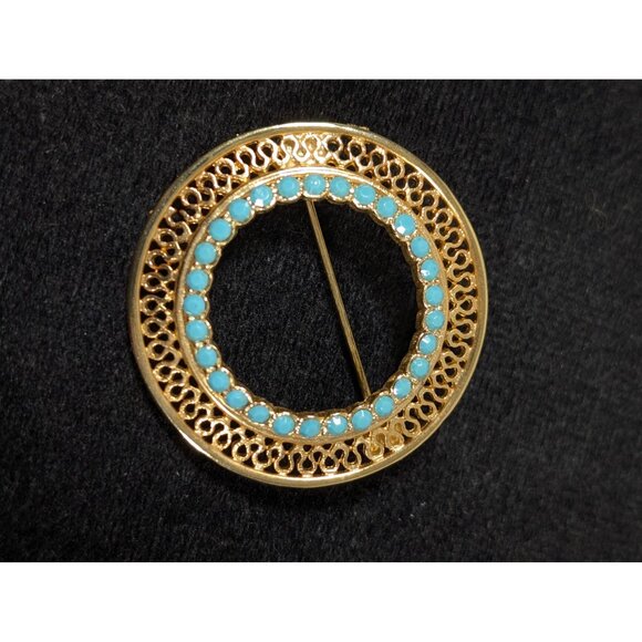 Vintage Blue Rhinestone Gold Tone Open Metal Work Filigree Round Brooch - Picture 1 of 6